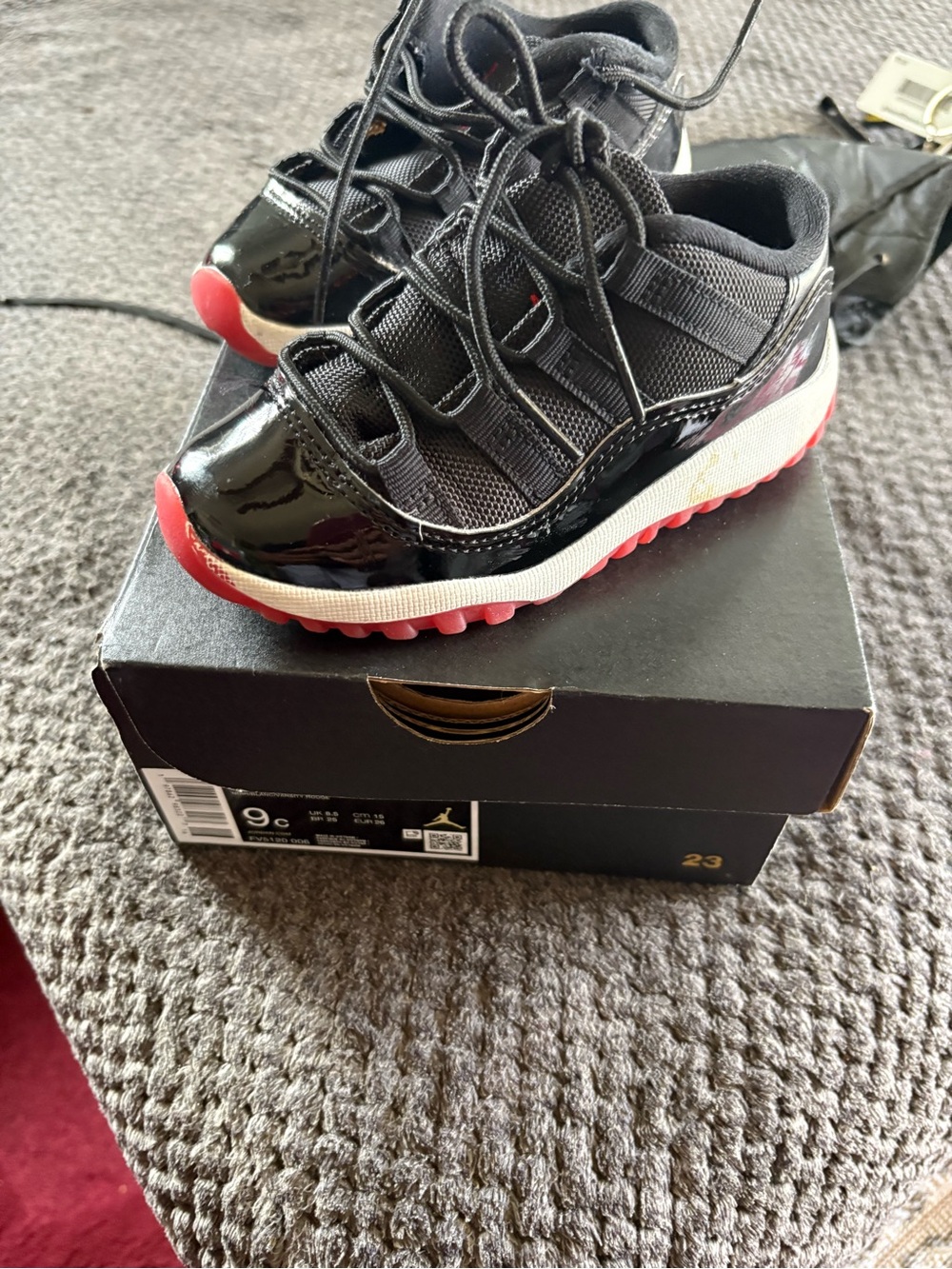 Jordan Kids Black and Red Low-Top Basketball Sneakers